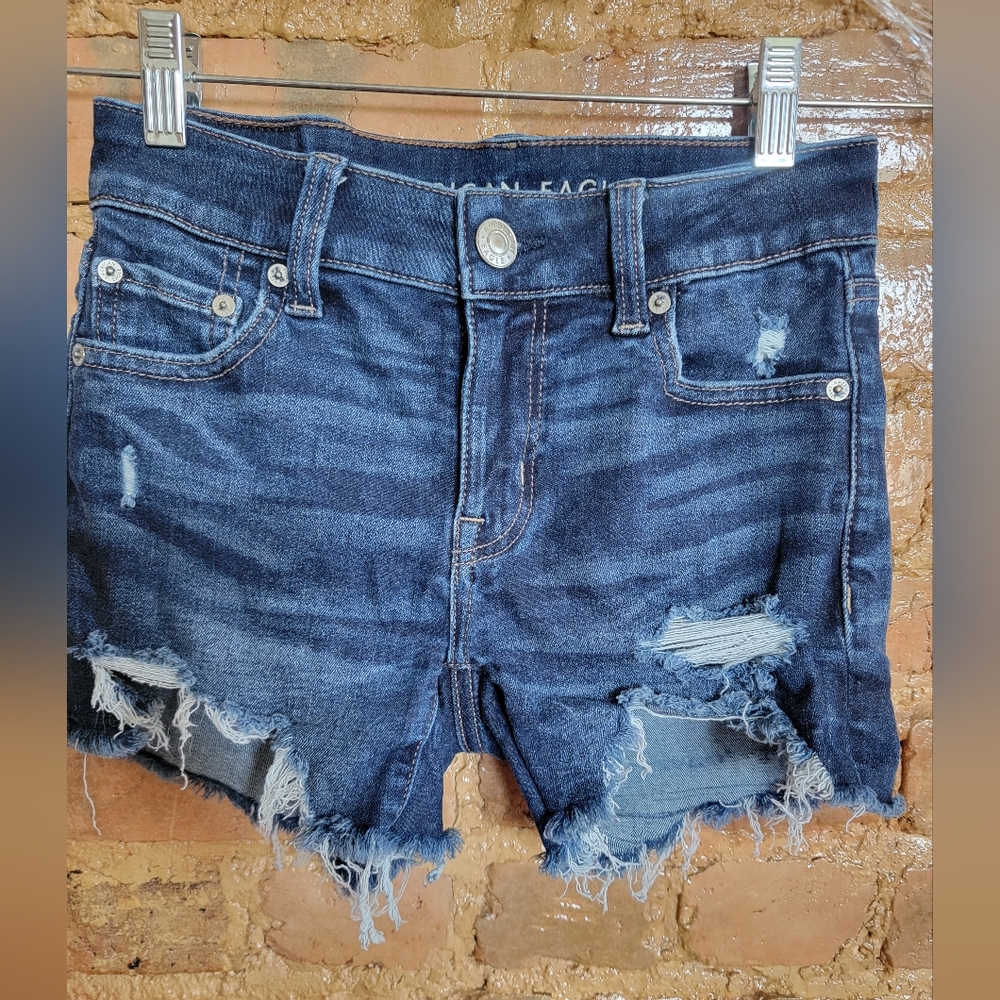 American Eagle distressed midi jean shorts